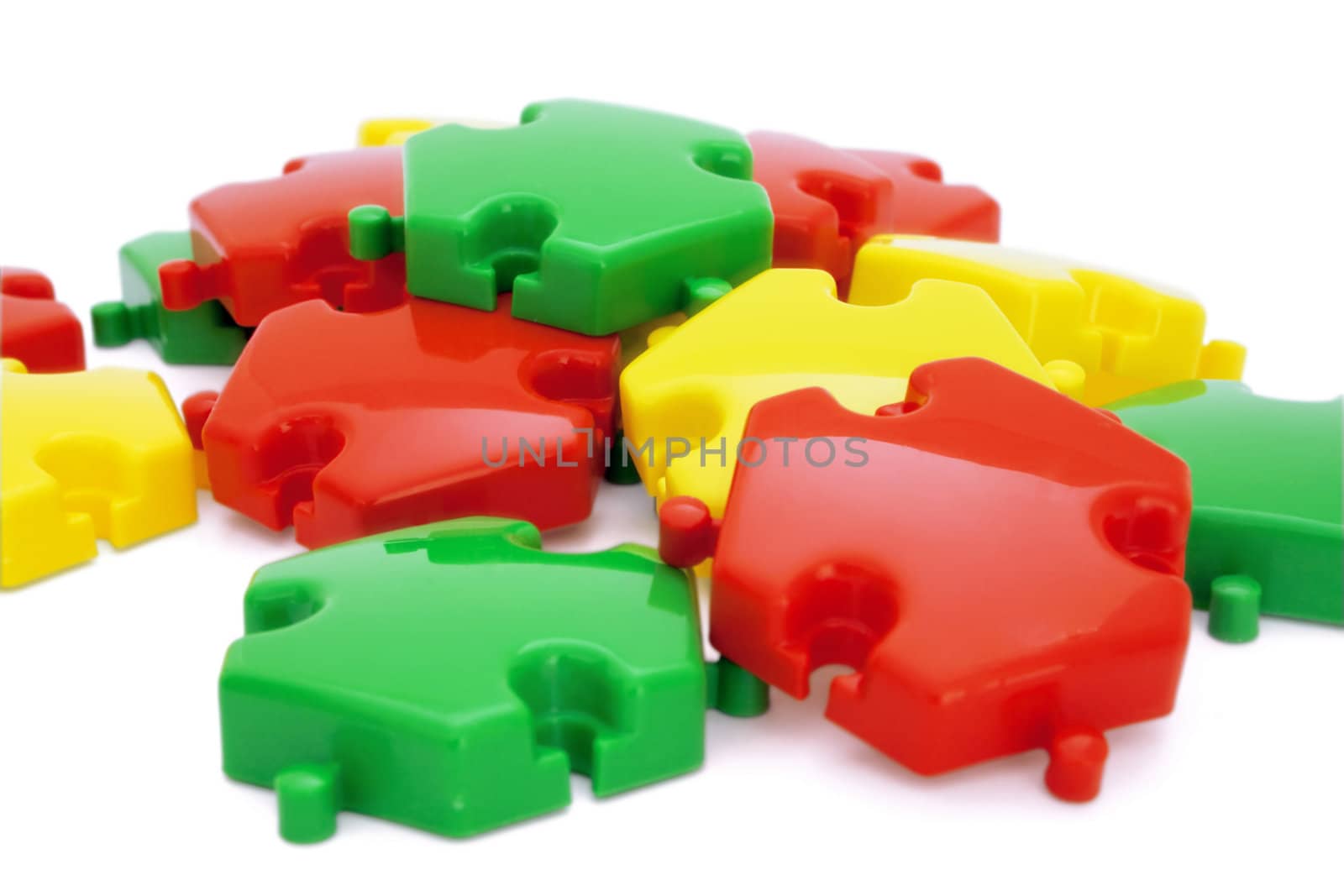 Parts of a puzzle with funny colors on a white background