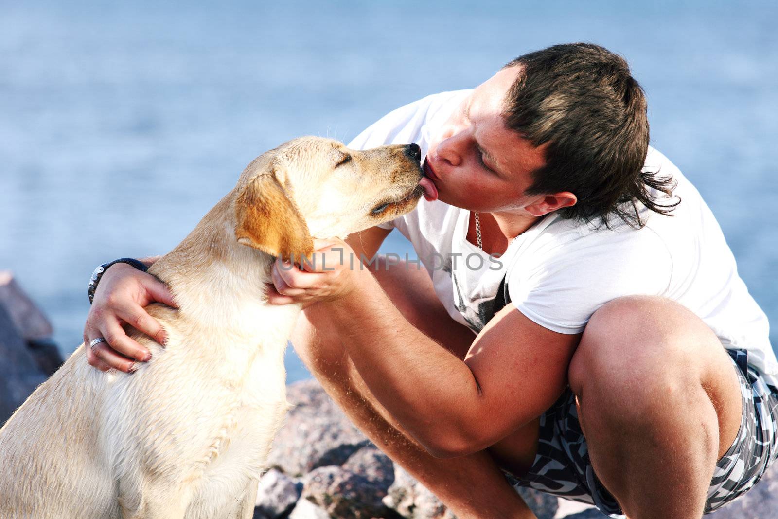 man and dog blue sky on background