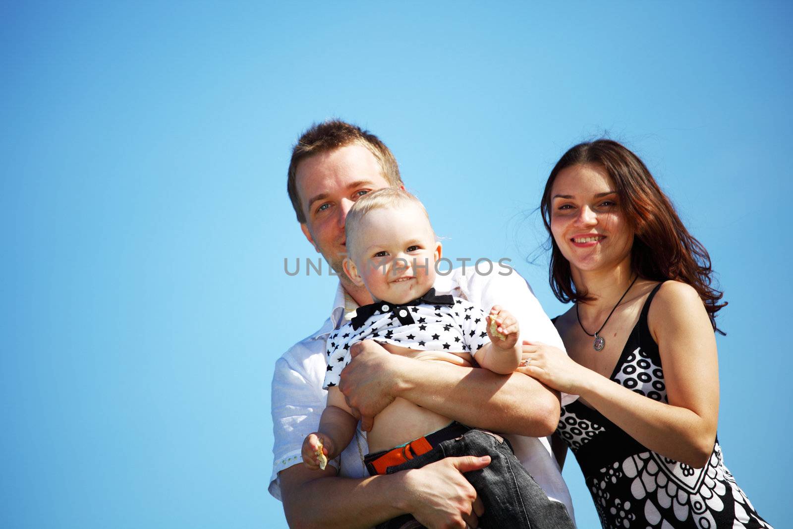 happy family blue sky on background