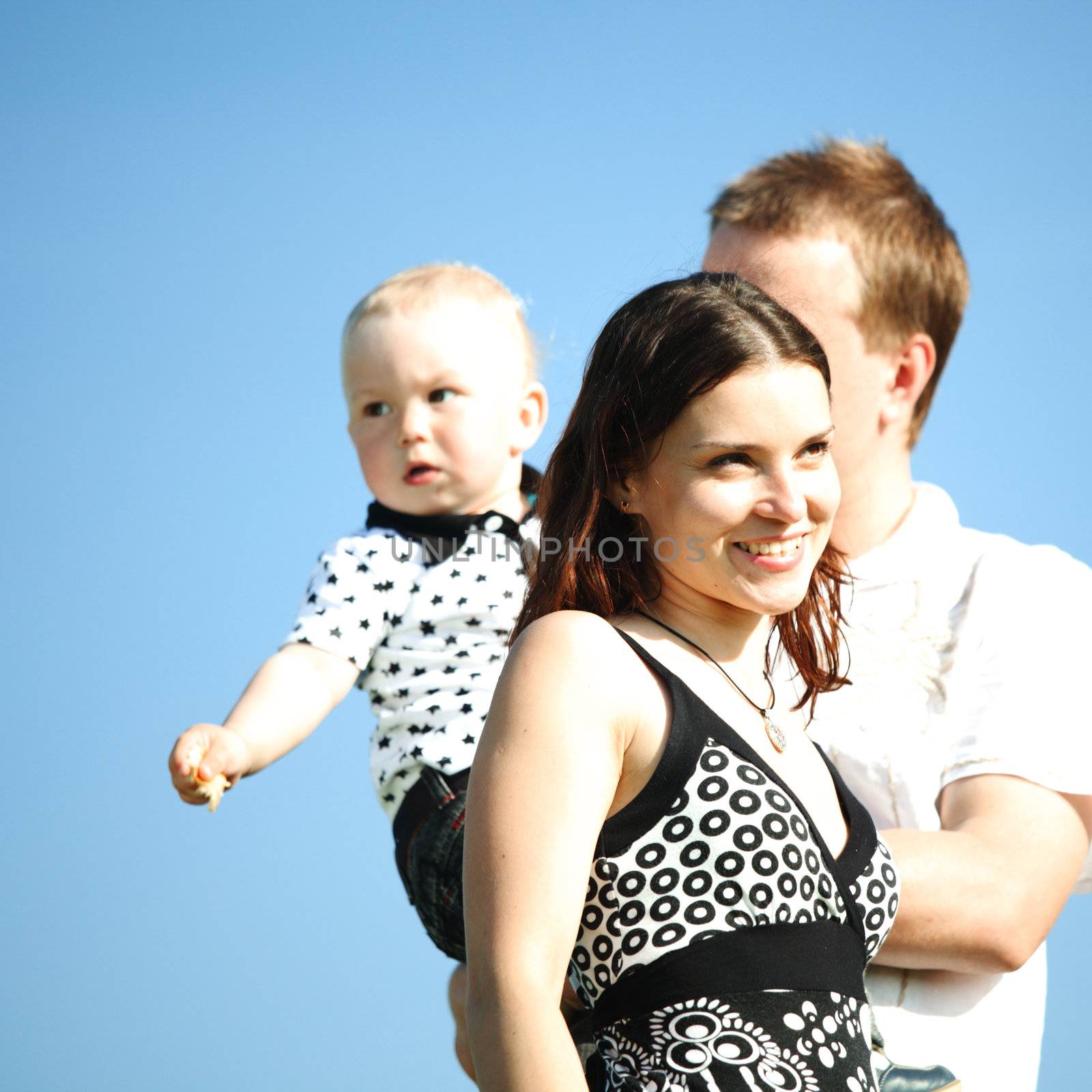 happy family blue sky on background