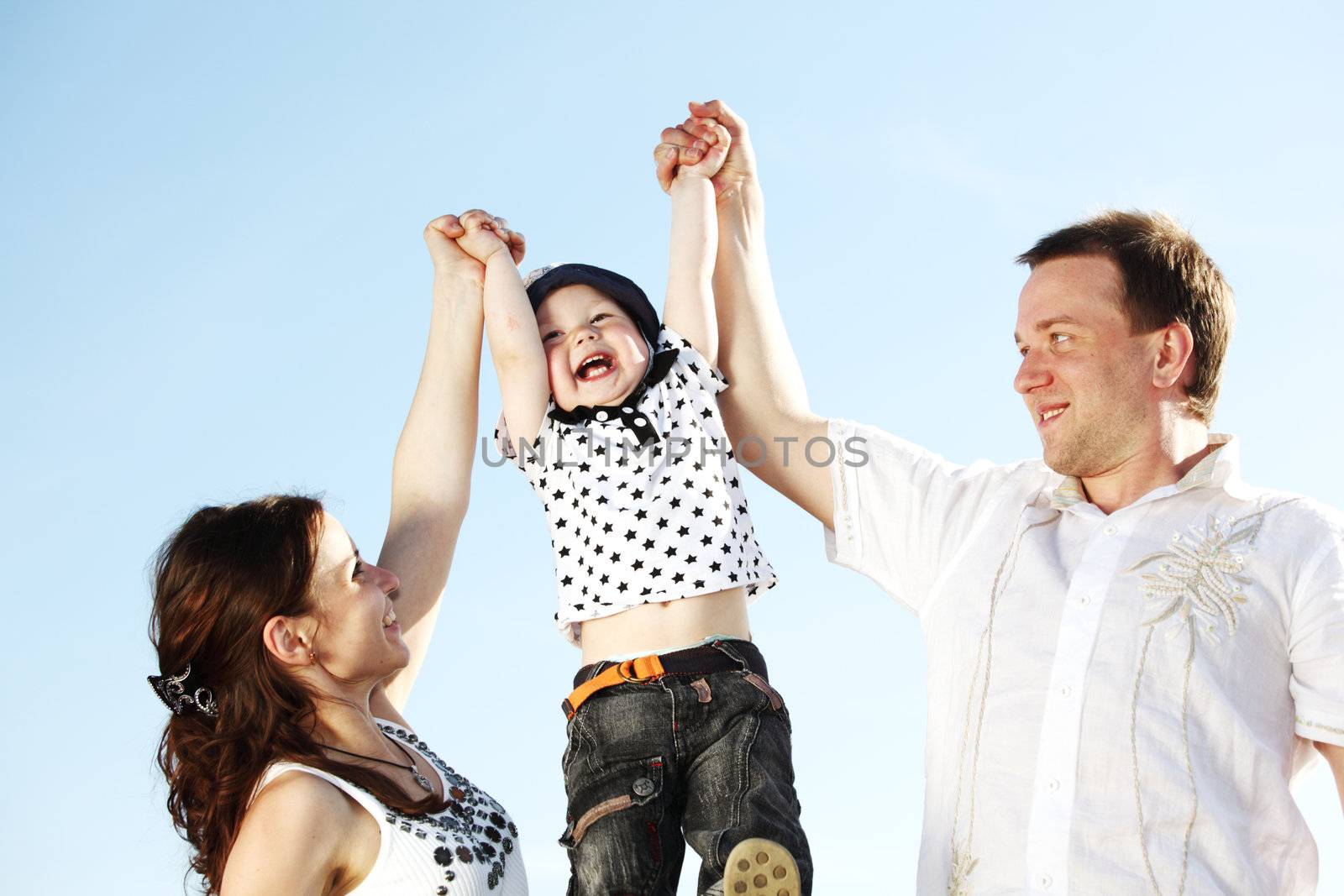 happy family blue sky on background