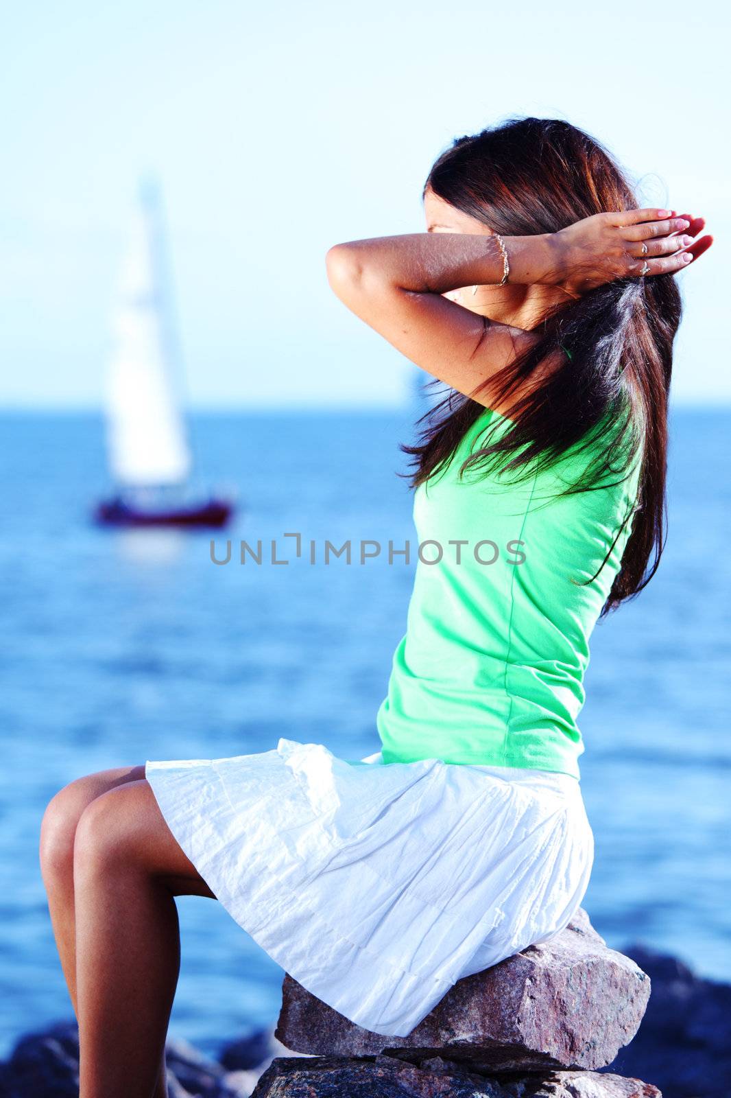 woman relax blue sea and ship on background