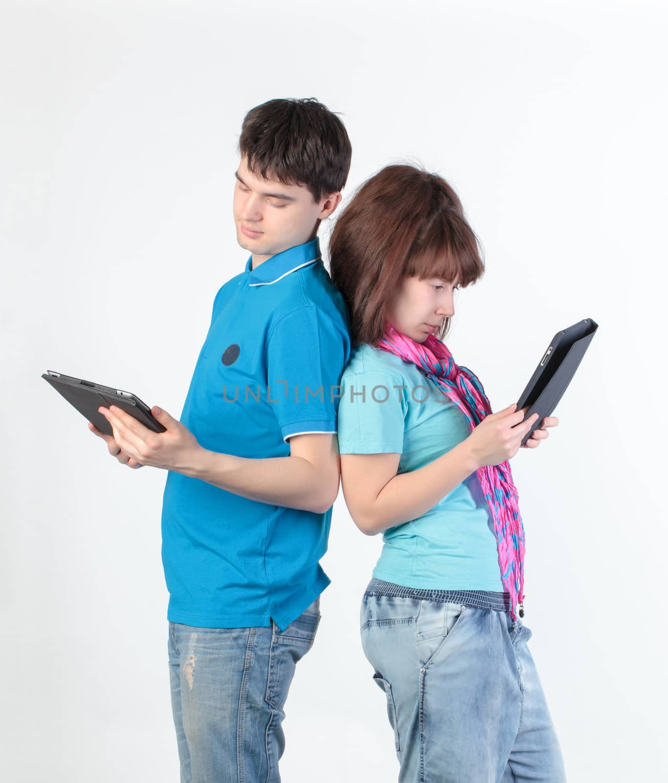 A young couple with a Tablet PC by Discovod