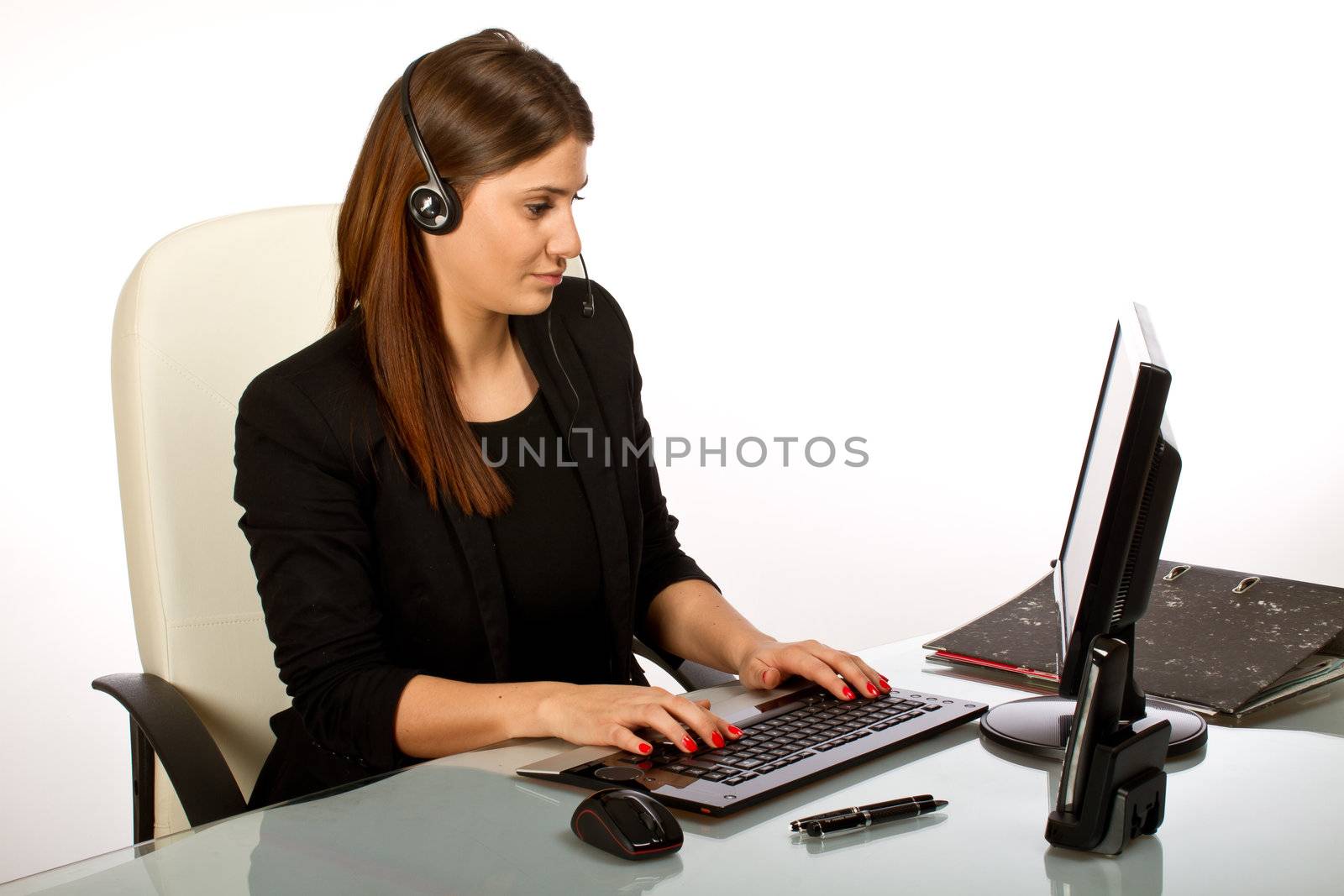 Three  office women working together on a computer