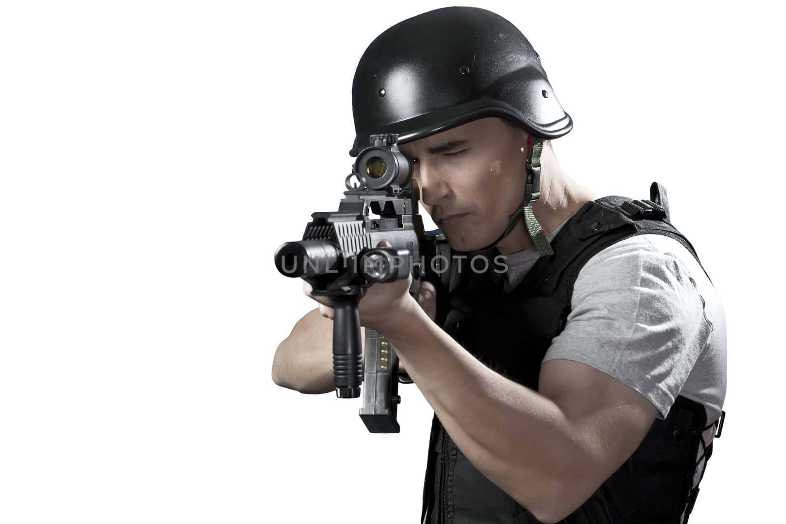 Armed policeman shooting, isolated on white by FernandoCortes