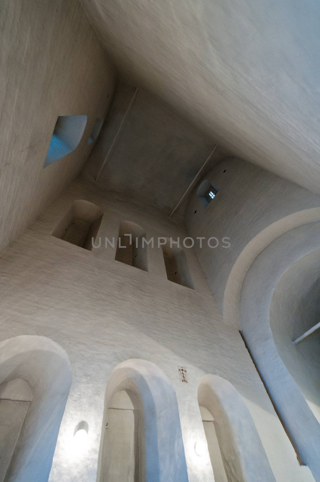 Old russian church white ceiling, arch forms and curves