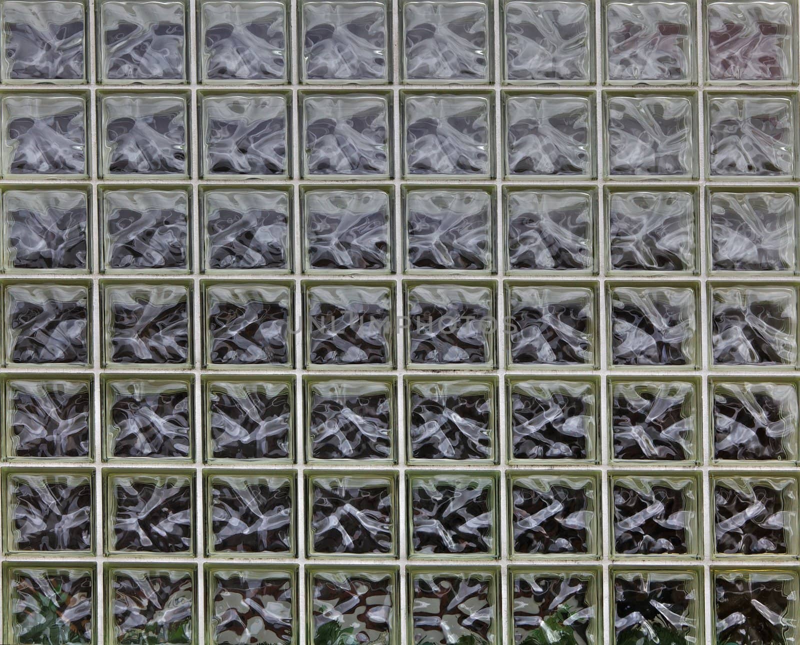 Many rows of a large glass brick wall