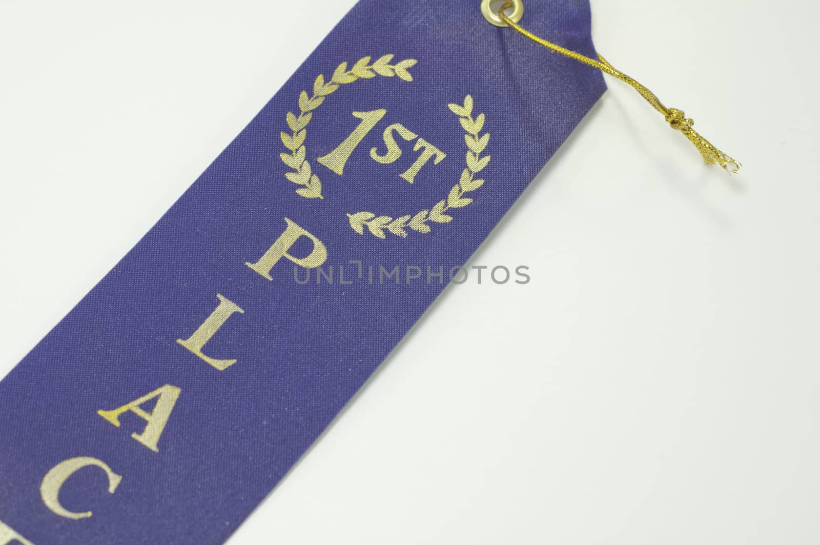 simple first place blue ribbon on white background