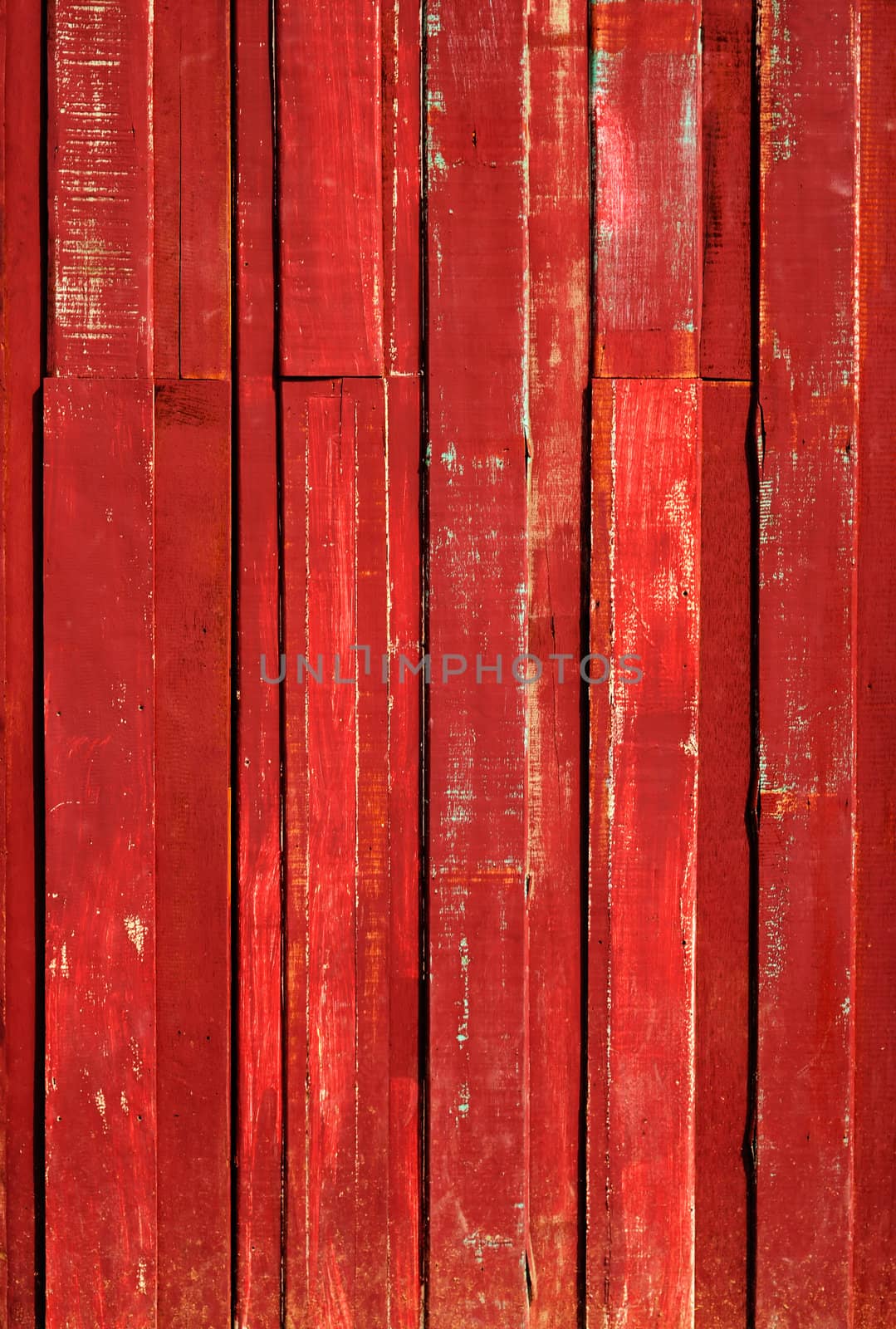 Texture of Red color paint plank vertical by nuttakit