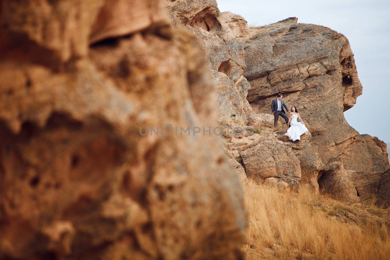 bride and groom on the mountain