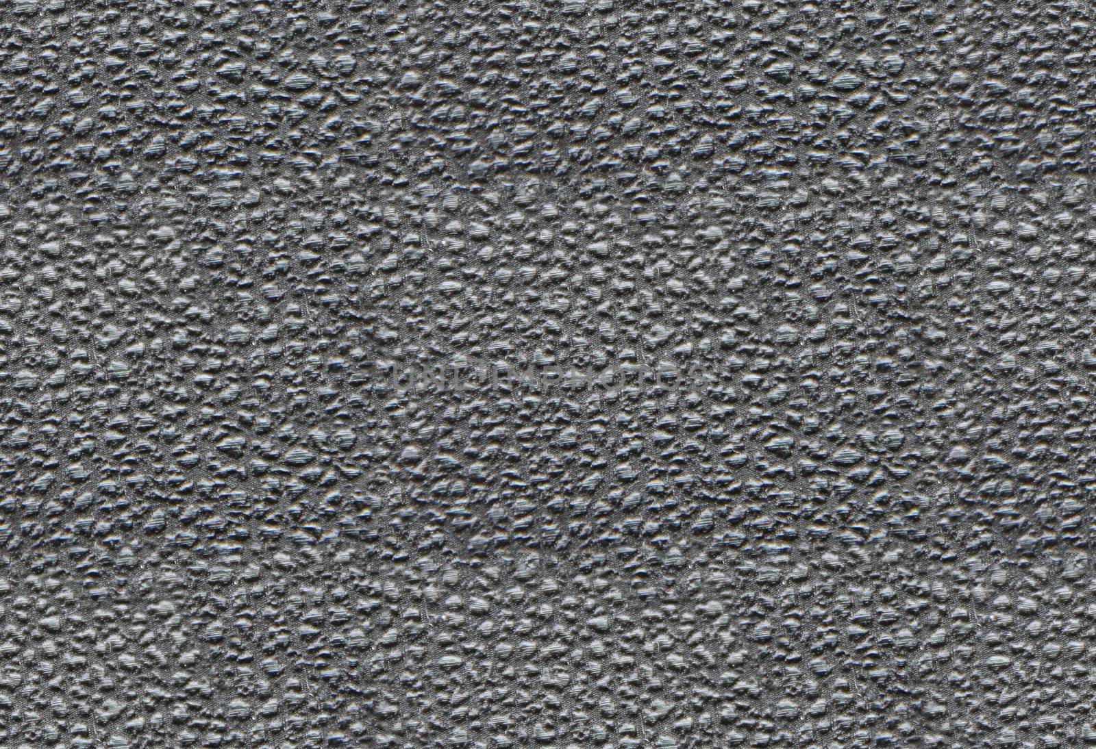 Artificial leather tiled texture background close up