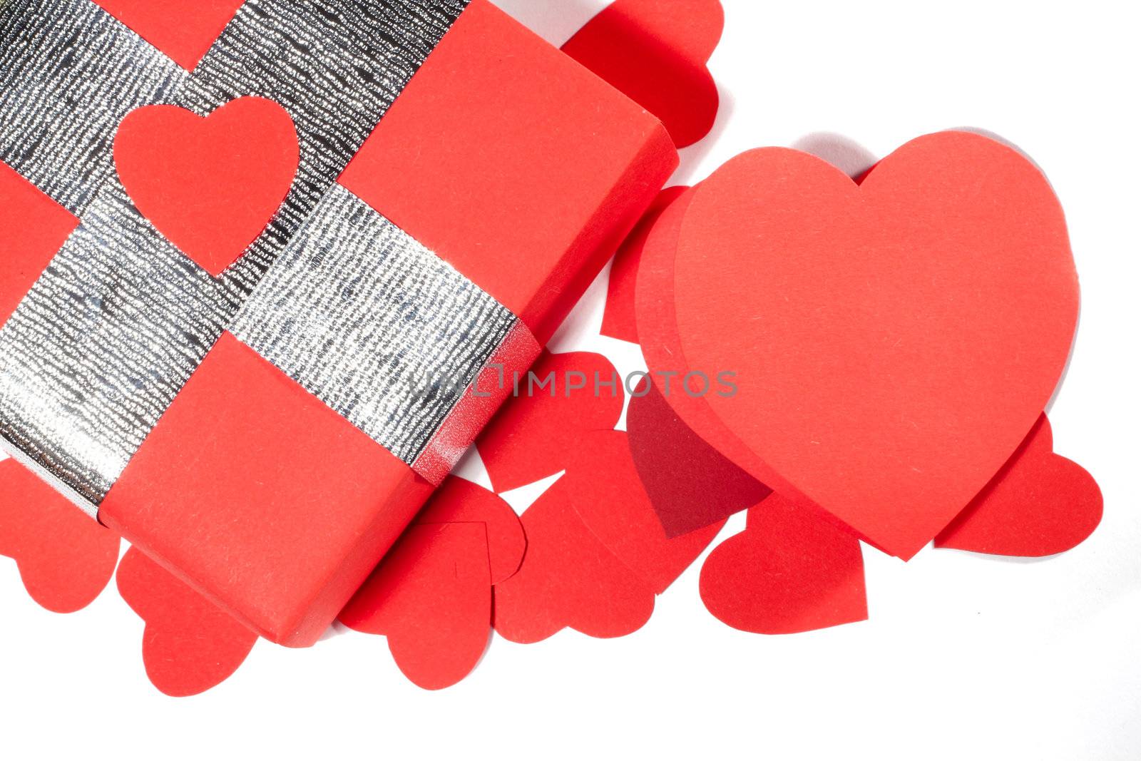 Valentines Day gift in red box and greeting card isolated on white top view