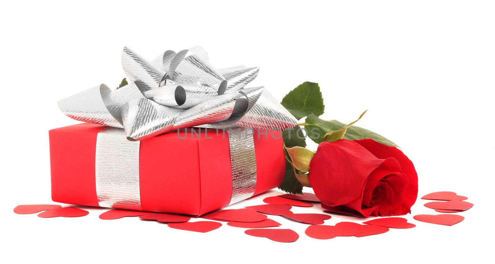 Valentines Day gift in red box with rose and small hearts isolated on white