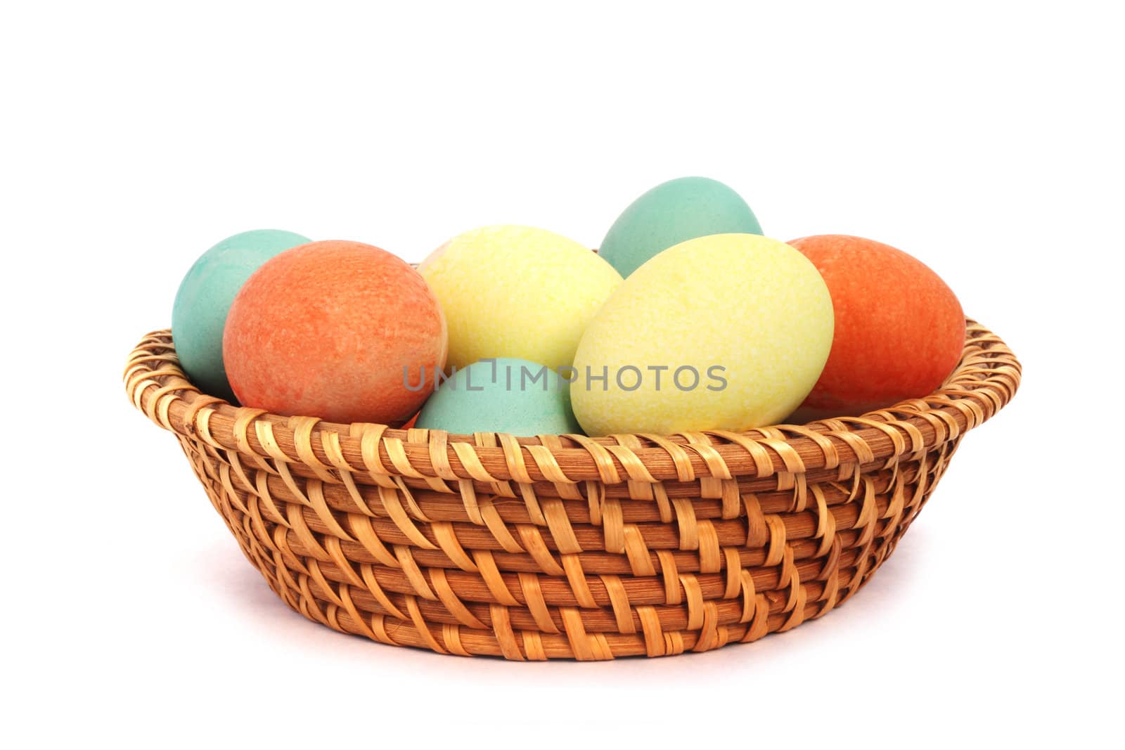 Easter eggs in basket by destillat
