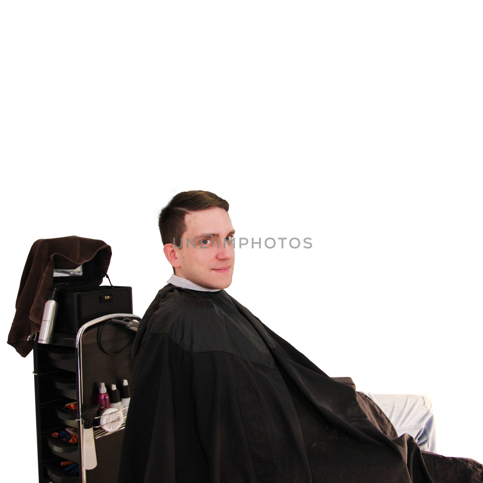 happier man in hairdressing salon by photochecker