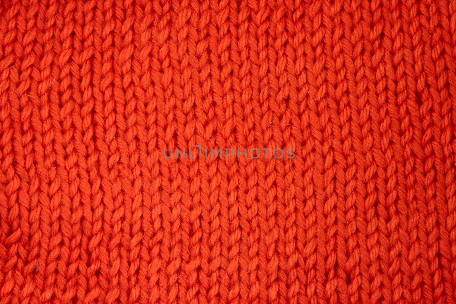Wool knitted textured background close up
