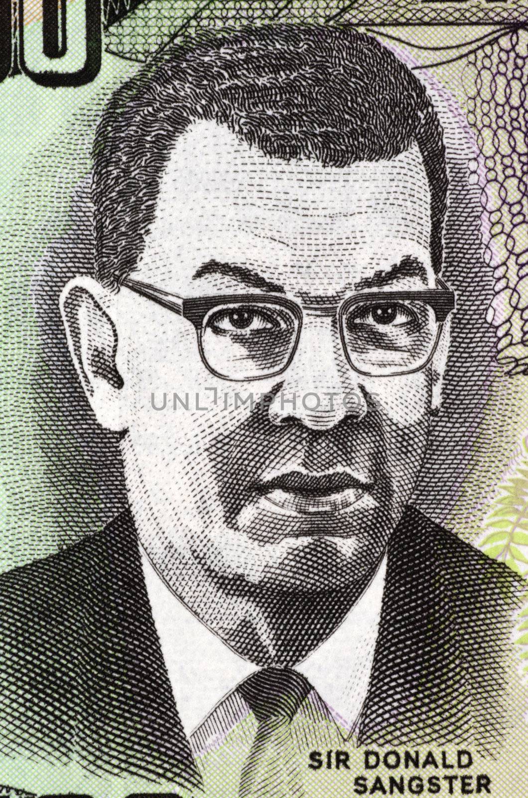 Donald Sangster (1911-1967) on 100 Dollars 2007 Banknote from Jamaica. Jamaican politician and the second Prime Minister of Jamaica.