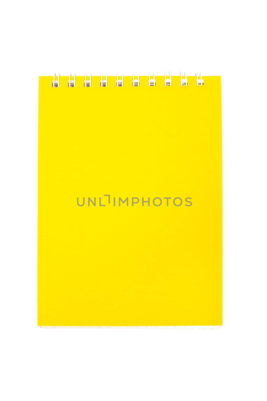 An image of yellow notebook on white background