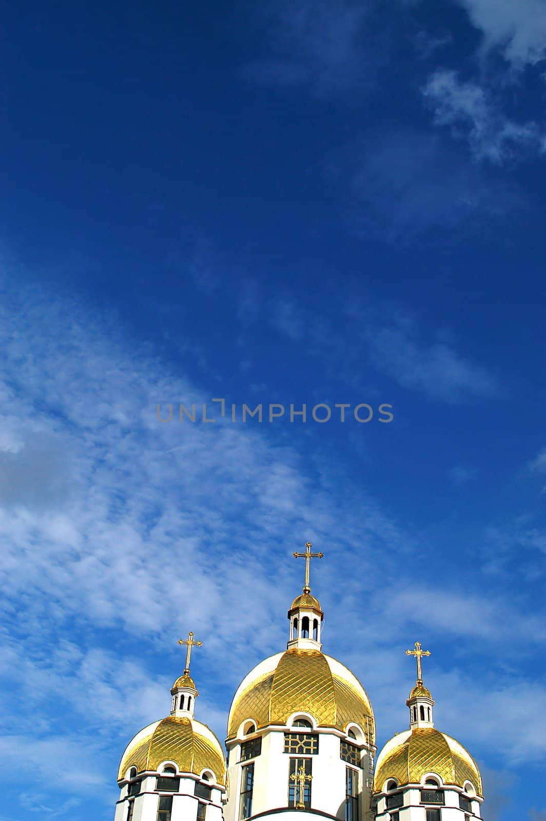 An image of a churches on a background of clouds