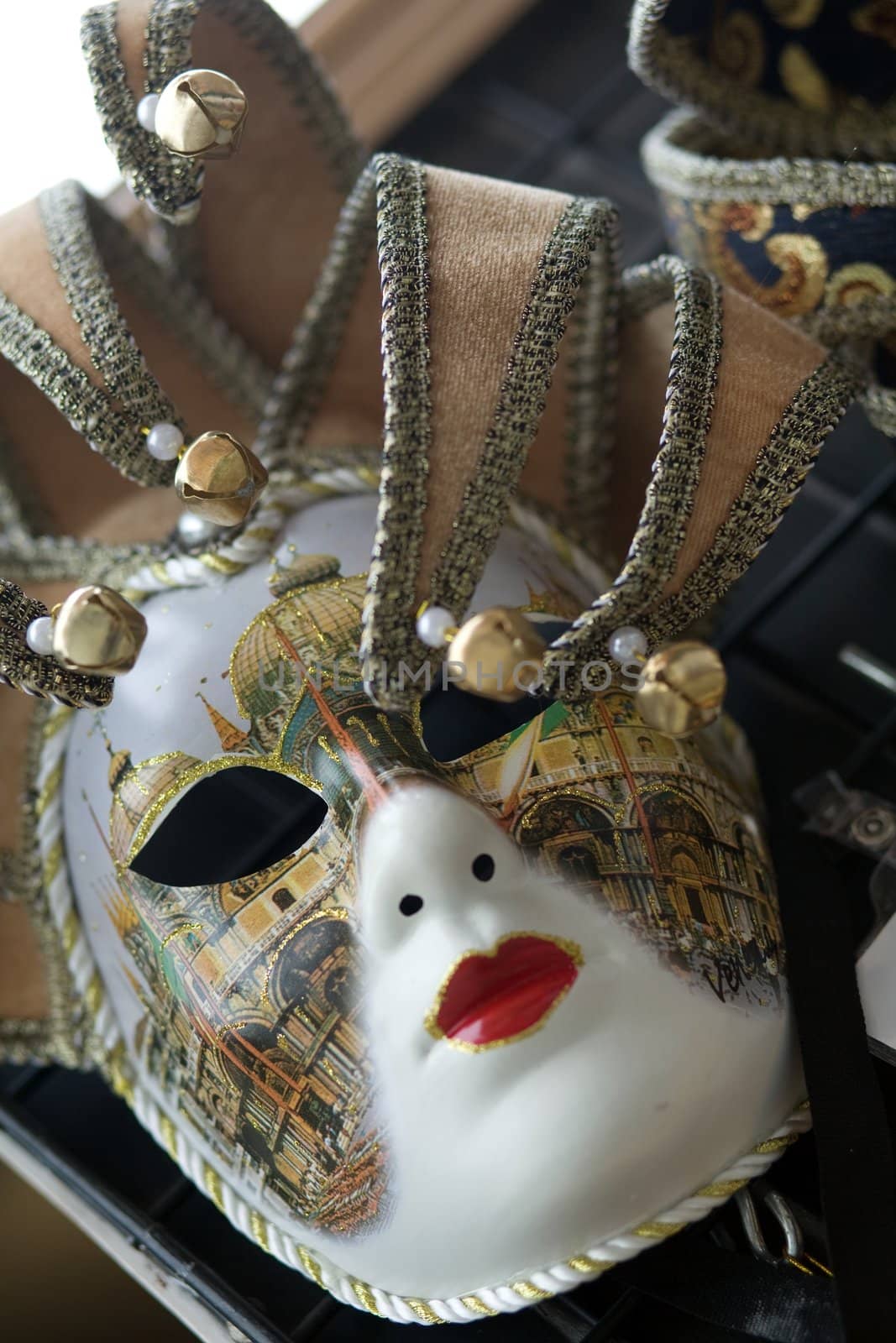 An image of beautiful venetian mask with bells