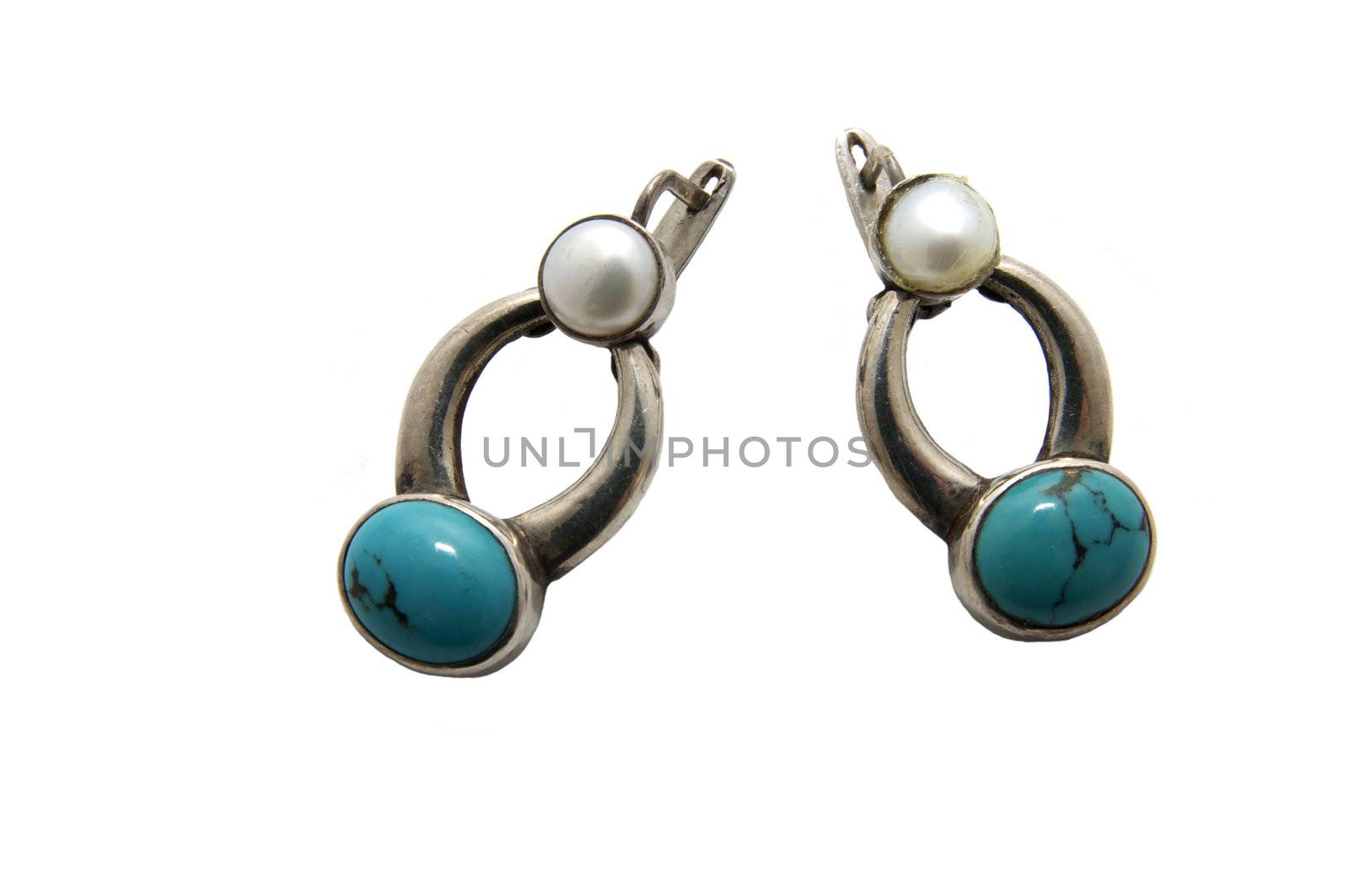 rings of precious metal with turquoise on a white background