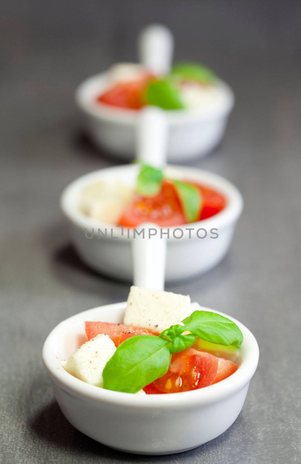 delicious italian salad in a ceramic bowl