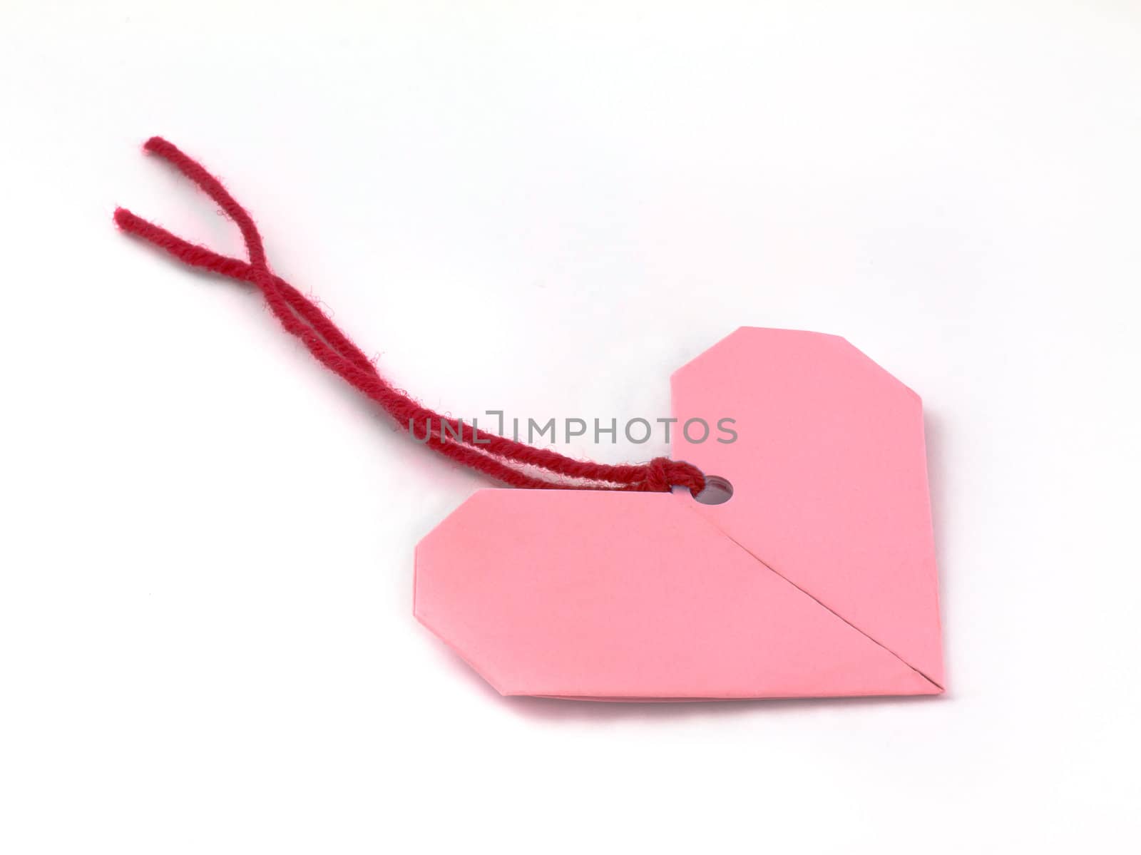 Paper heart isolated on white