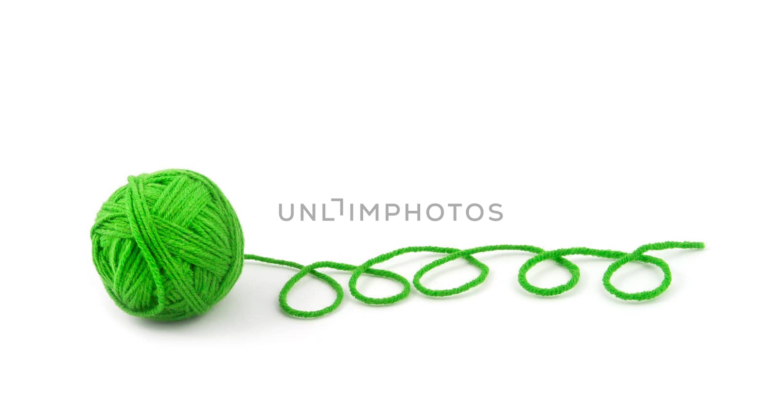 Green thread ball isolated on white background