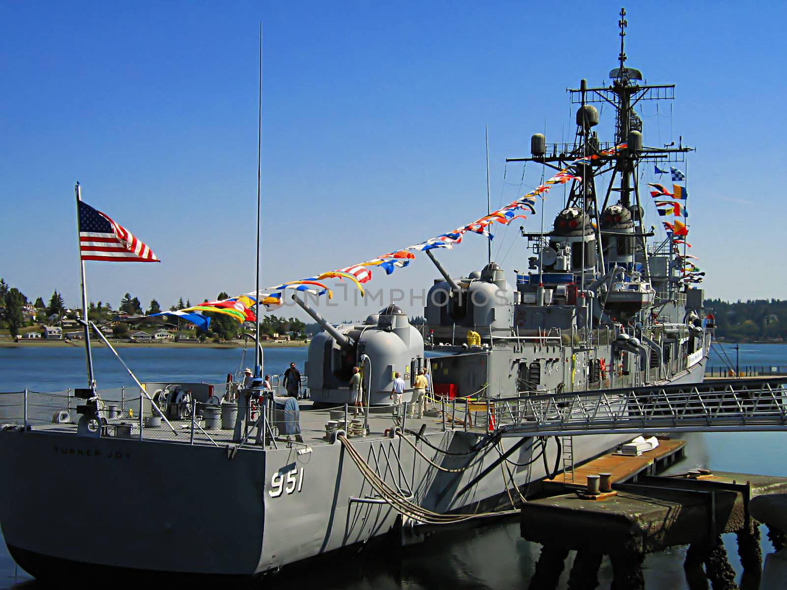 A photograph of a Forrest Sherman-class naval destroyer detailing its structure and design.  This particular ship was commissioned in 1959 and was known as the DD-951 USS Turner Joy.  It was retired from United States military service in 1988.