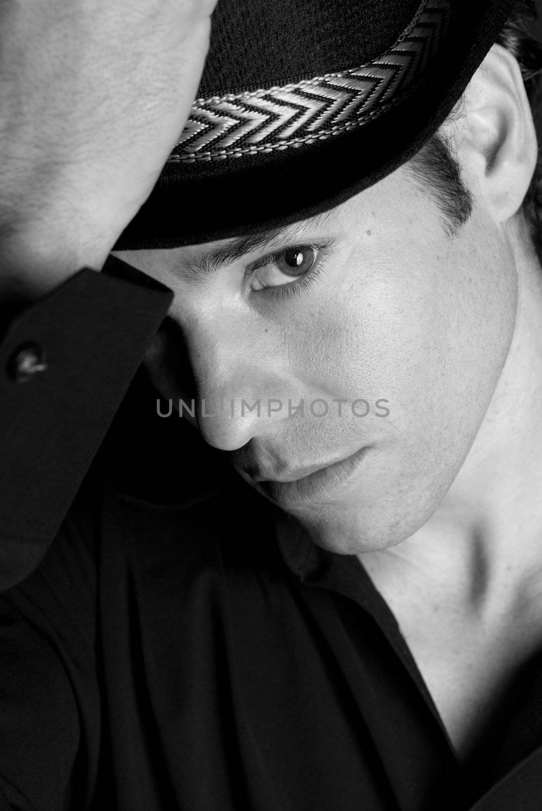 Handsome man portrait with hat black and white