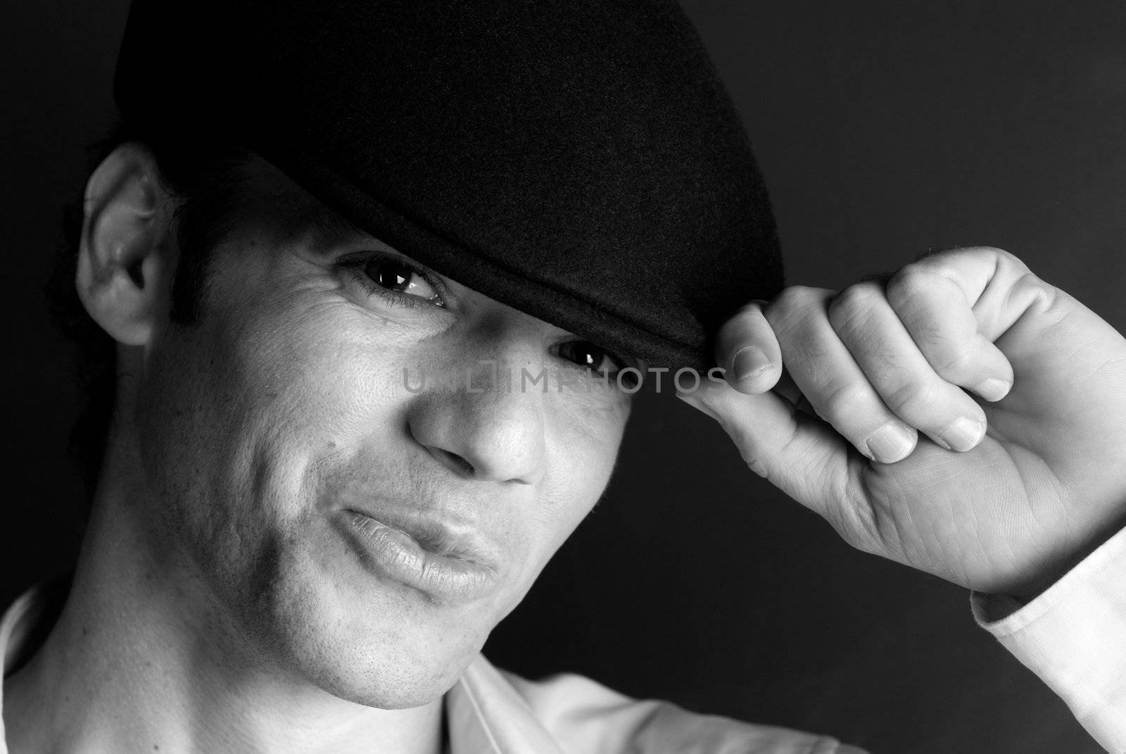 Handsome man portrait hat black and white by dgmata