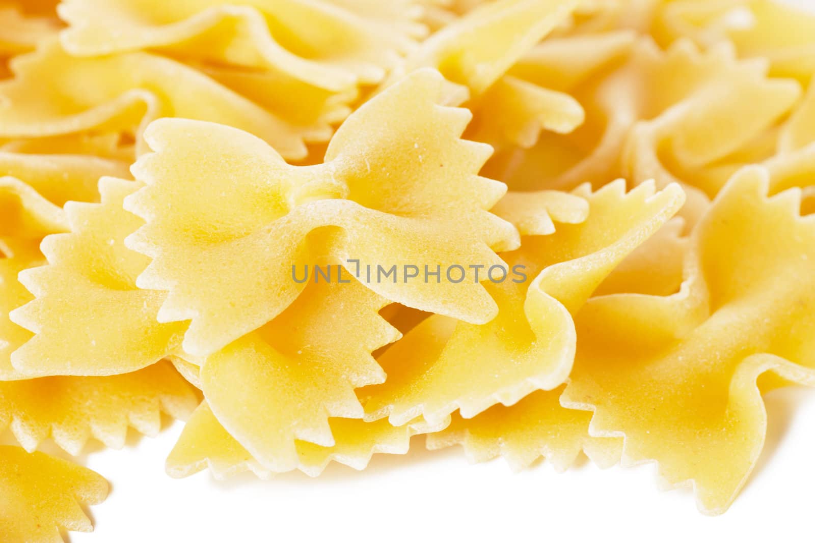 Closeup view of dried bow shaped macaroni