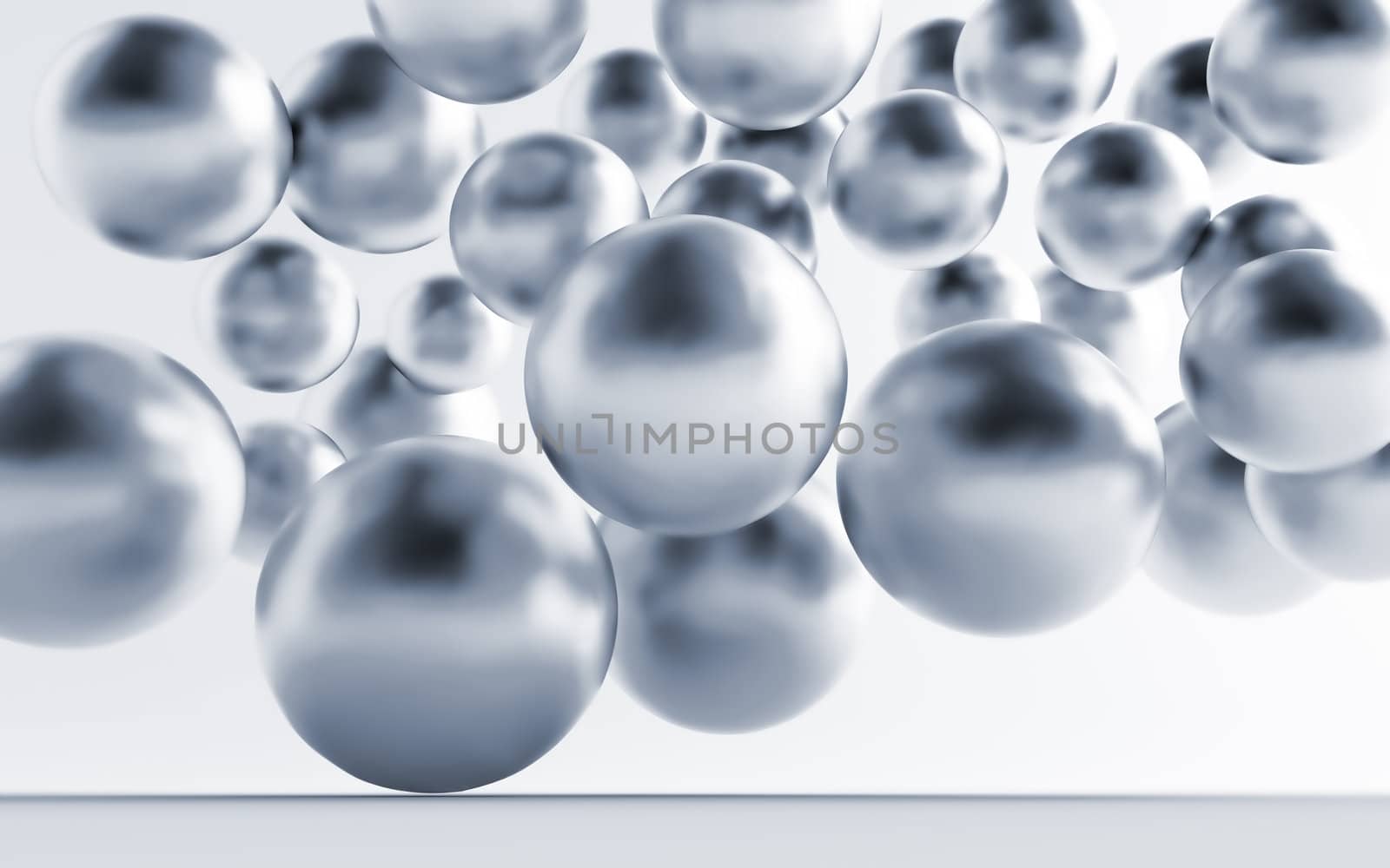 Falling and hitting gray metallic spheres on a white background