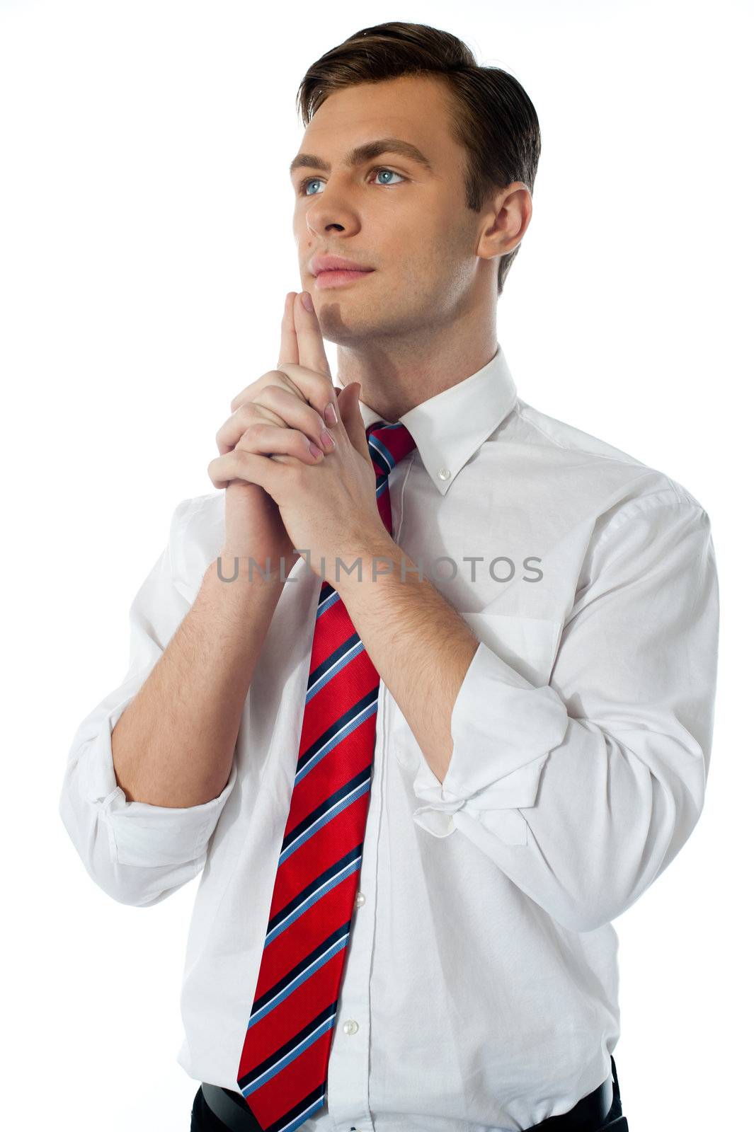Mature male executive thinking by stockyimages