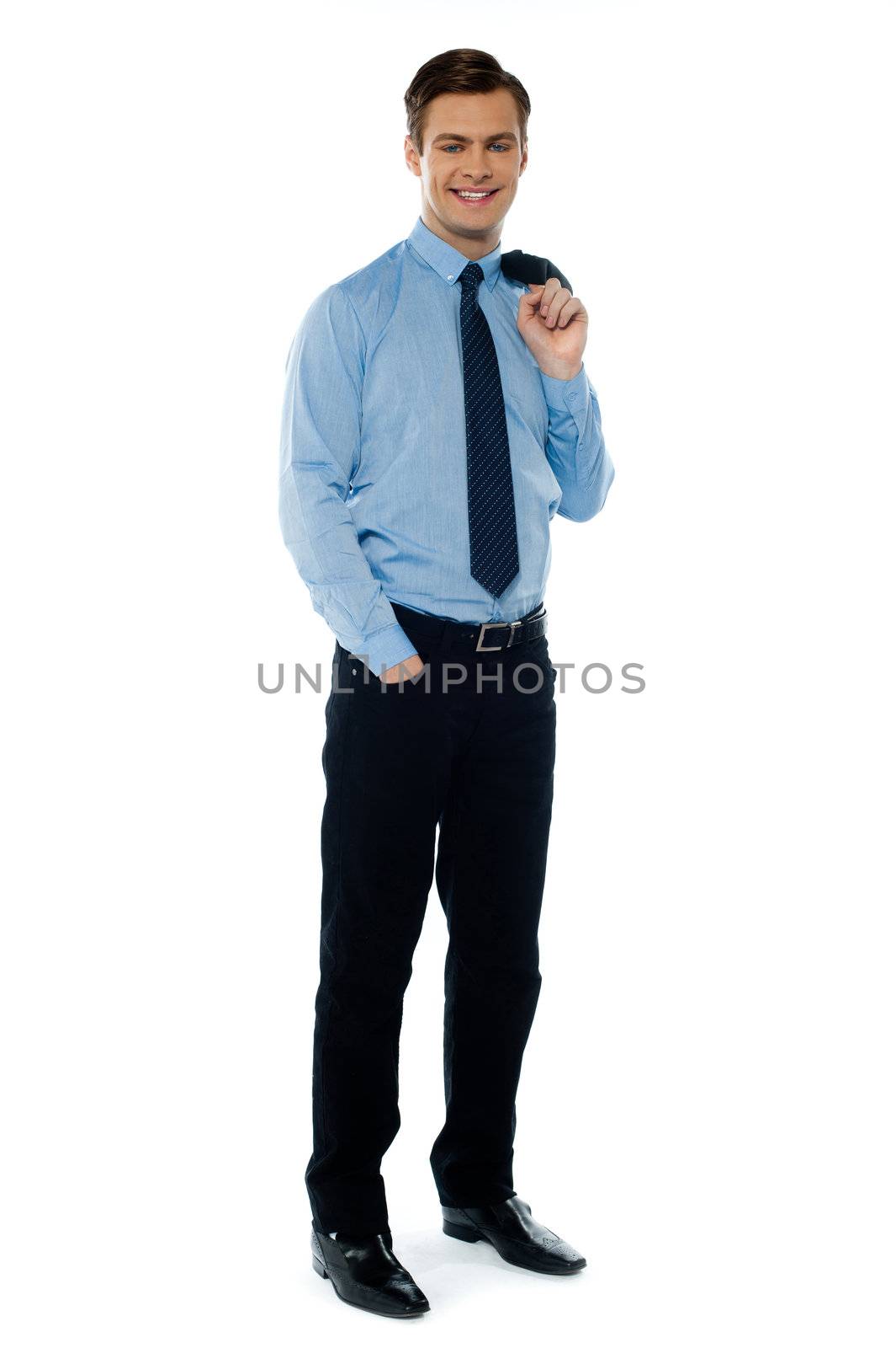 Portait of a professional businessman holding his coat and posing in style