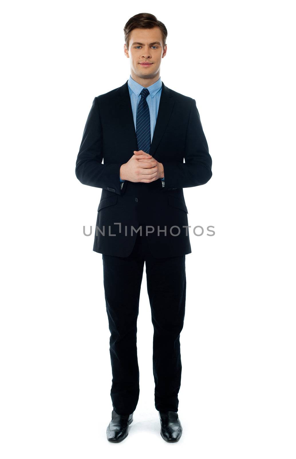 Handsome businessperson posing in front of camera