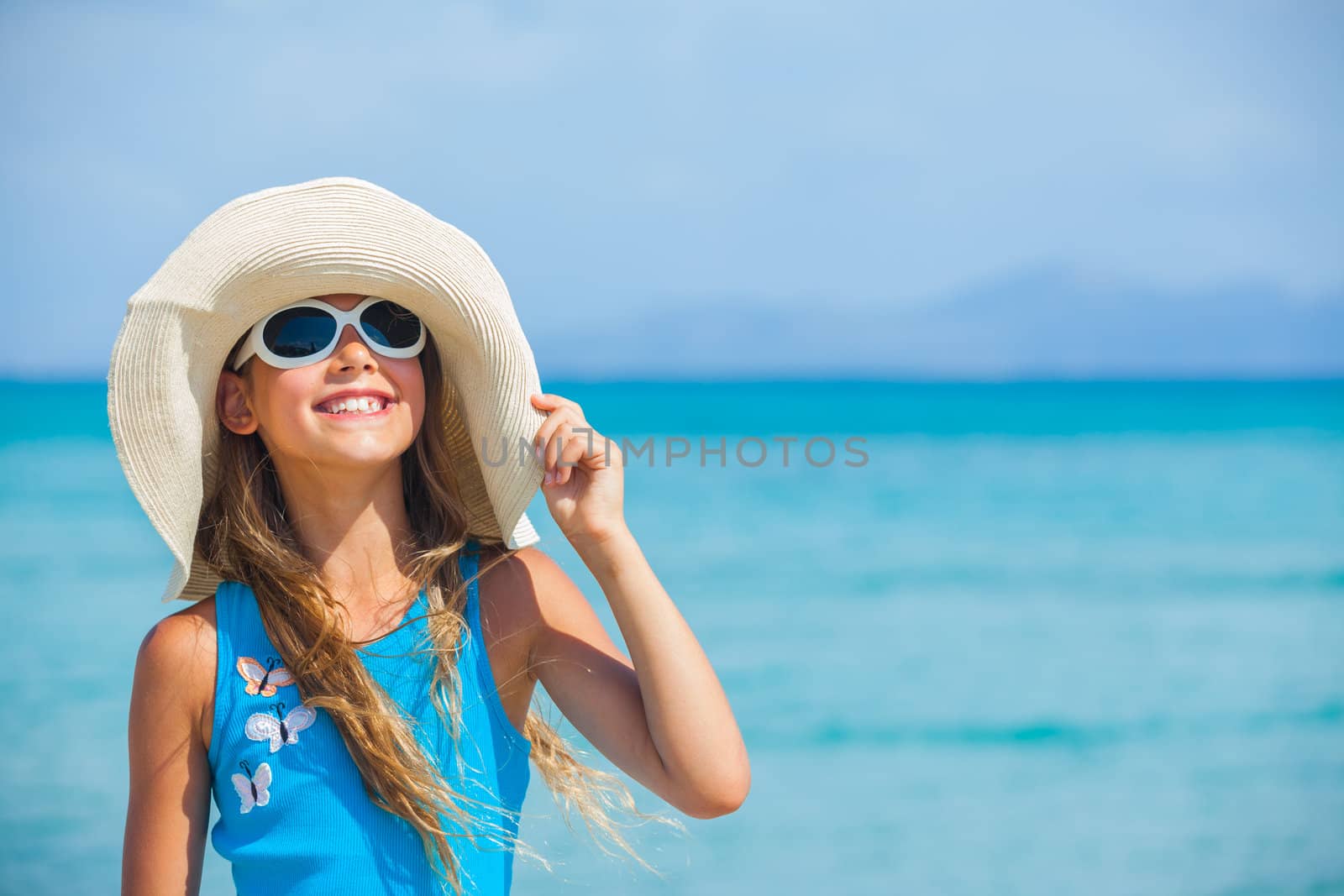 Cute teens girl in big hat relax ocean background