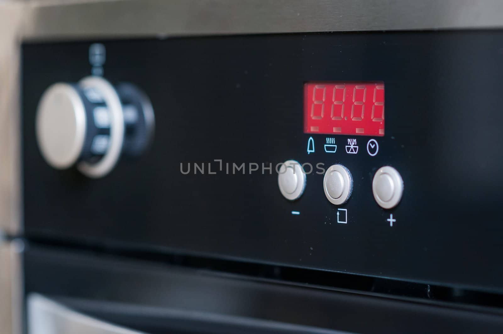 controls on the oven for a close-up