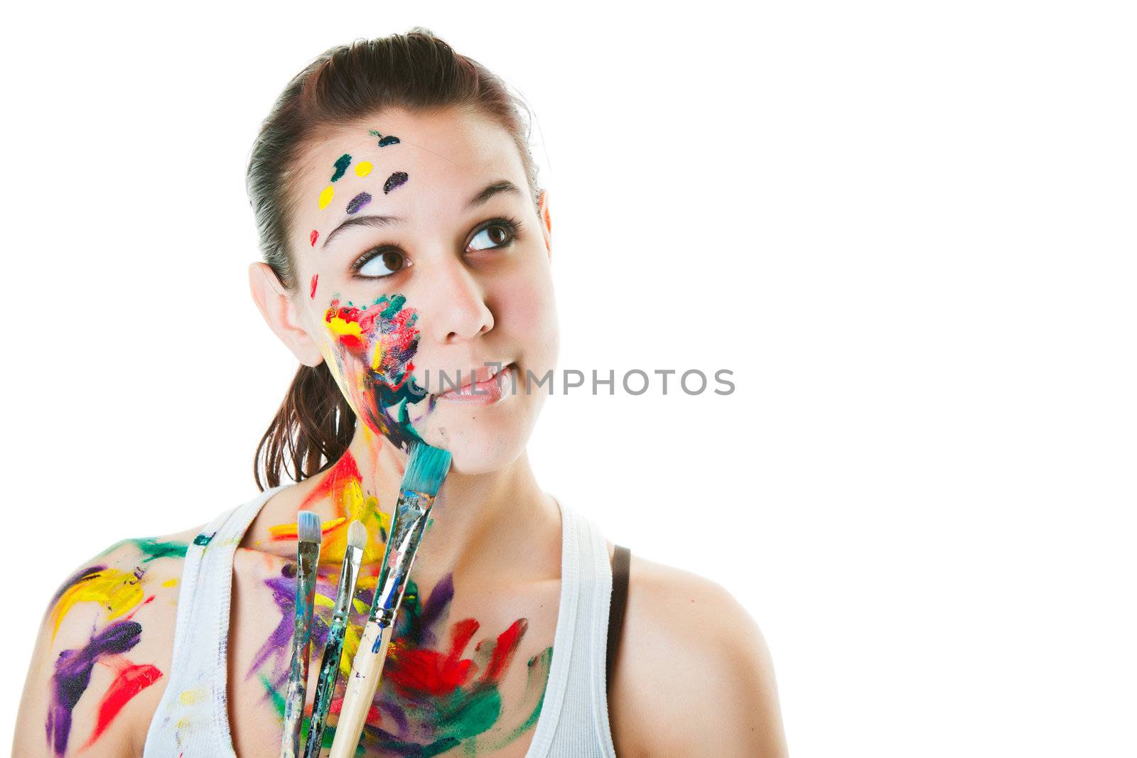 An artist thinking about her next work of art.  Shot on white background.