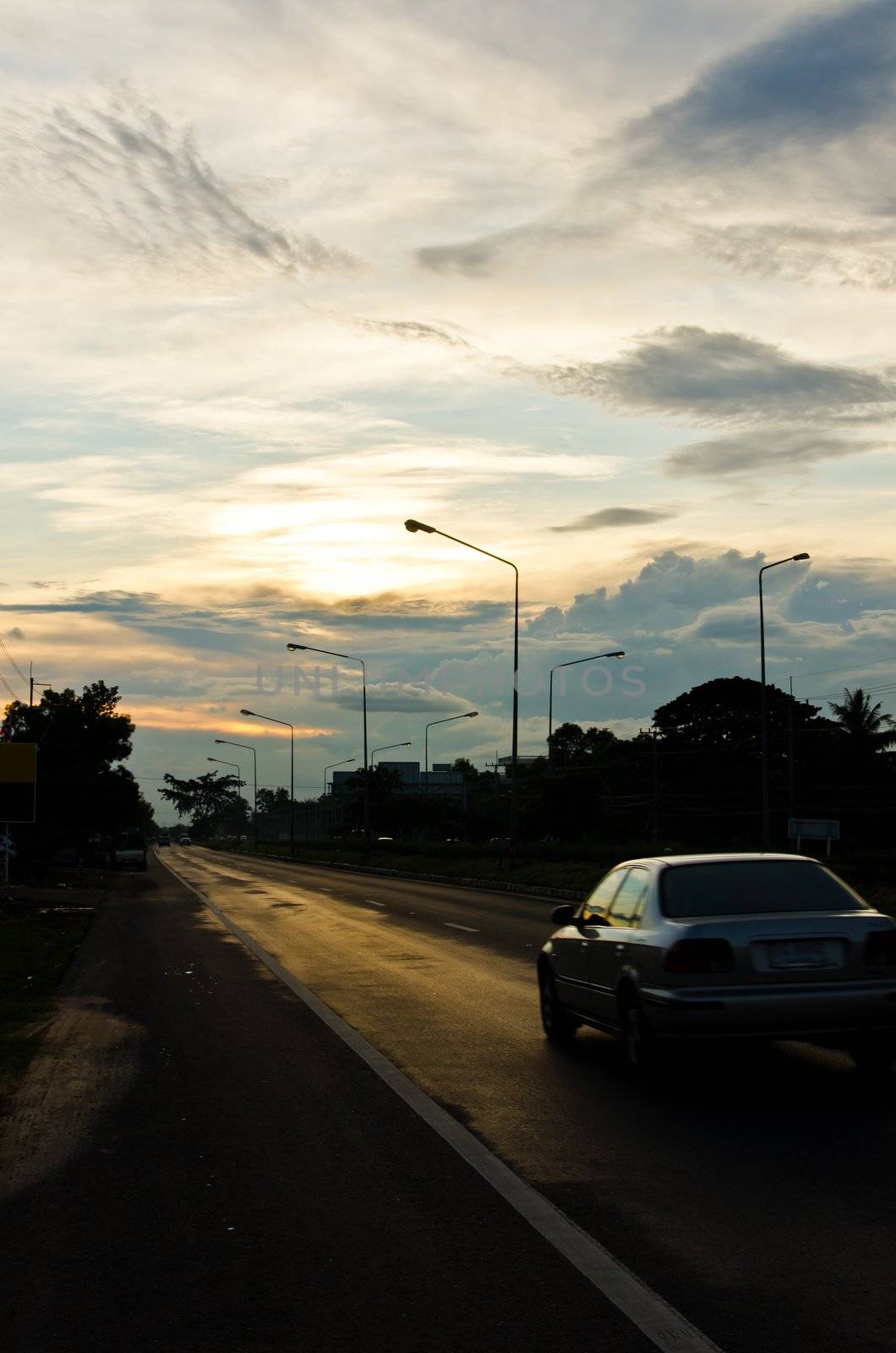 motion car on the road and bluesky in evening