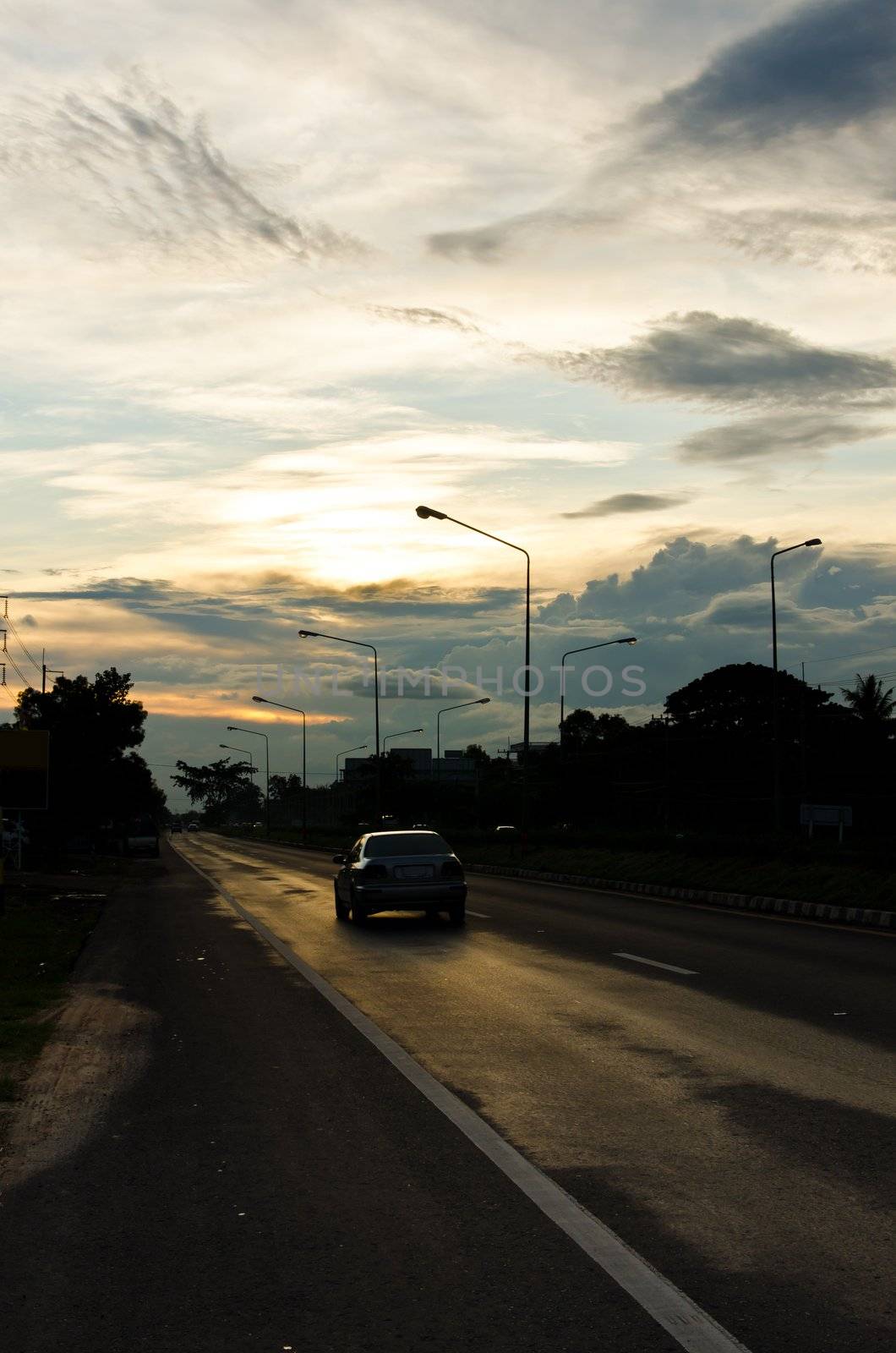 motion car on the road and bluesky in evening