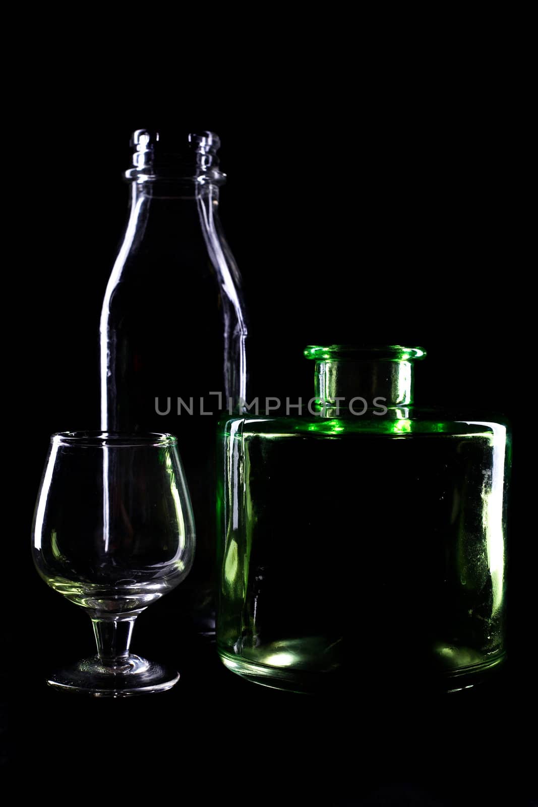 An image of bottles on black background