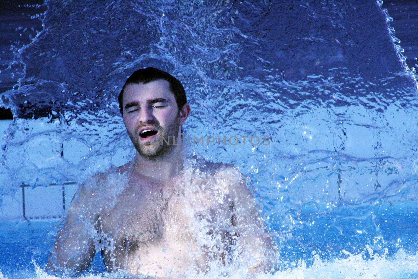 young attractive man relax in spa area