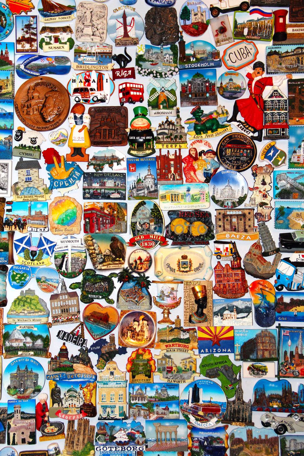 Collection of magnets from different countries on wall