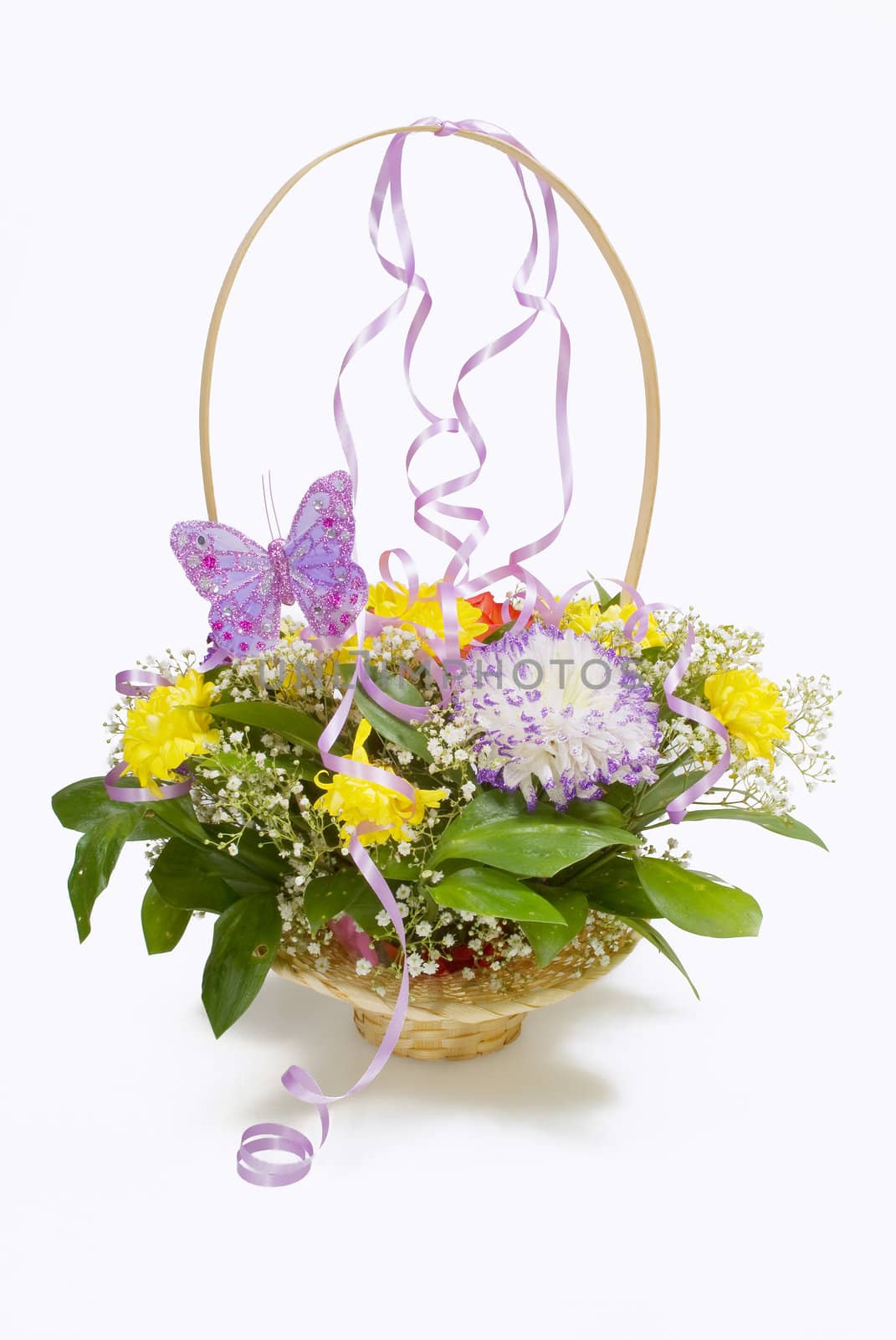 Basket of flowers with a butterfly and ribbons