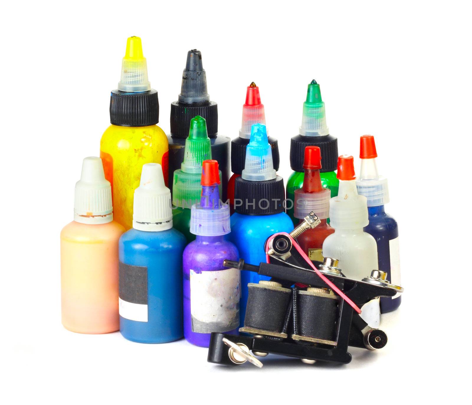Tattoo machine with many color ink bottles isolated white background