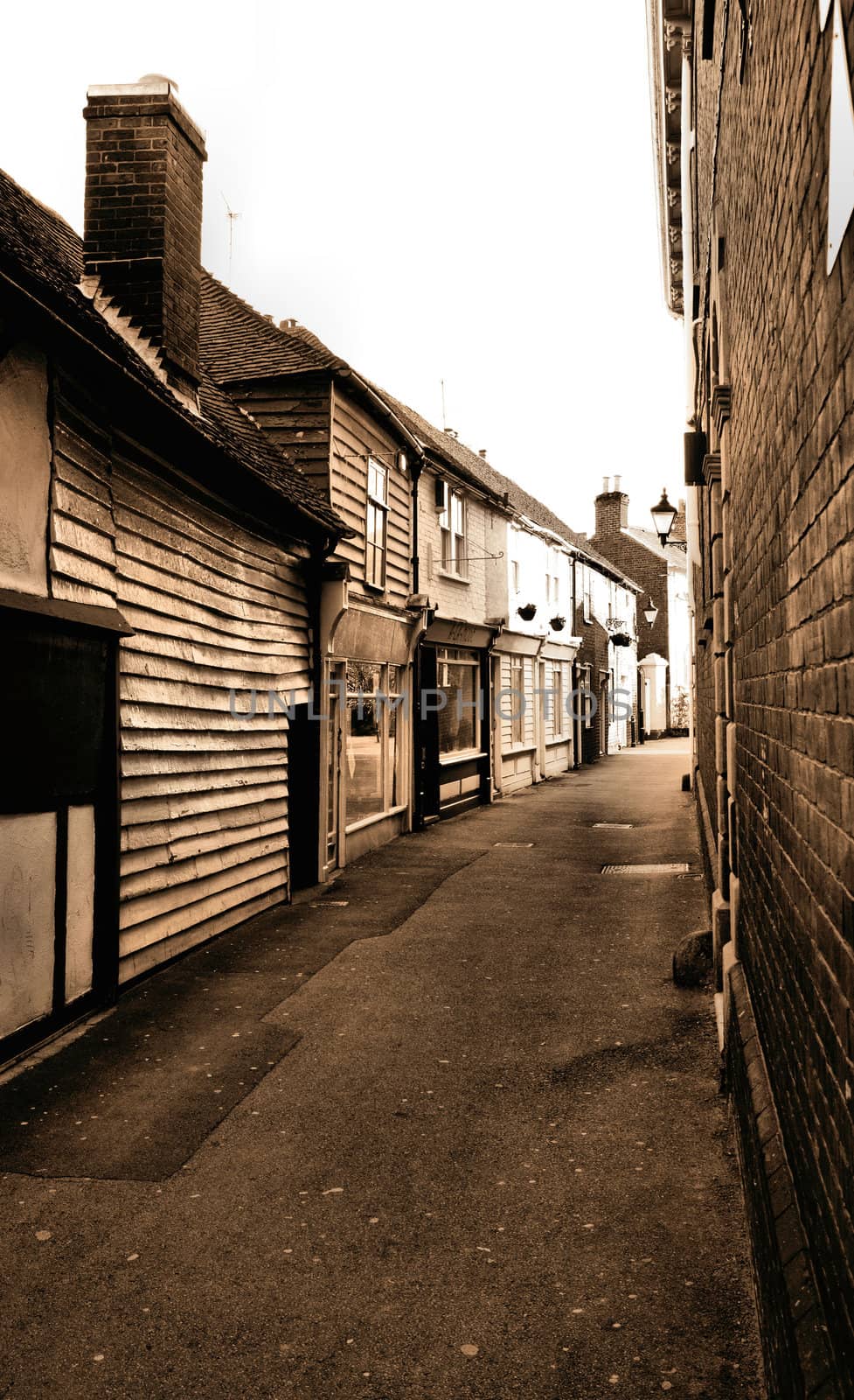 Old properties form the main part of this narrow alleyway in Favershamn Kent