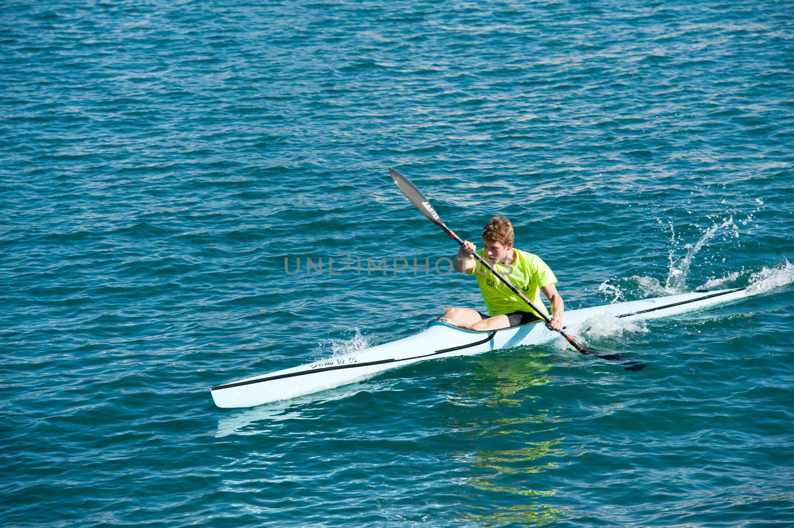 LAS PALMAS, SPAIN – MARCH 10: Unidentified man from club amigos del piraguismo in Canary Islands, kayaking during Boat and Marine Expo FIMAR 2012 on March 10, 2012 in Las Palmas, Spain
