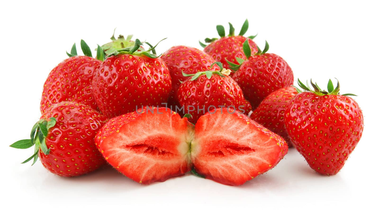 Ripe Sliced Strawberries Isolated on White by alphacell
