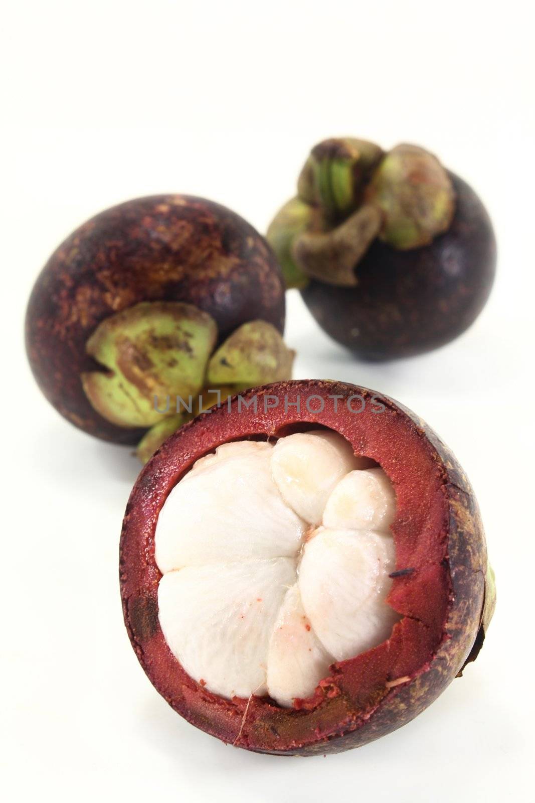 fresh mangosteen on a white background